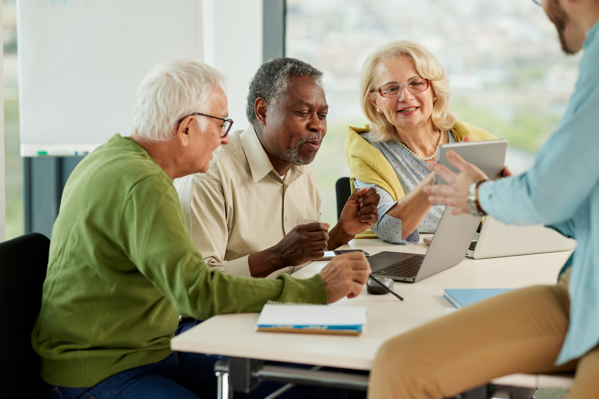 group of seniors learning tech